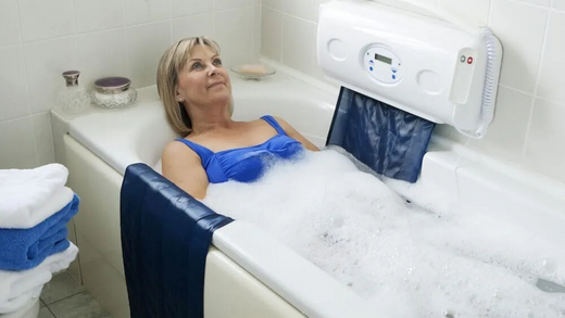 Woman in bath with the Relaxa Bath Lift