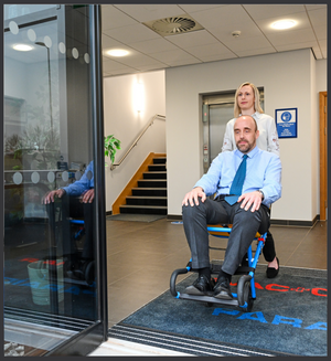 patient pushed out of building with Evac+Chair 200H Evacuation Chair For Horizontal Evacuation