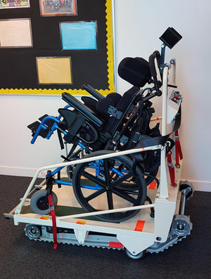 Evaccess Sunwa SUPER TRAC TRE-52 Powered Stair Climber with a wheelchair on 2