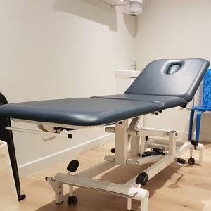 Stabil Komfort 3-Section Treatment Table in a clinic