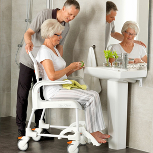Etac | Enhance Comfort and Accessibility with the Clean Shower Commode Chair Designed for Easy Maneuverability and Optimal Hygiene man help patient