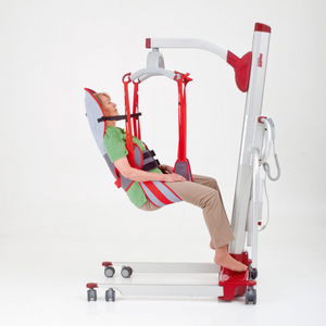 Etac | Enhance Comfort and Safety with RgoSling Toilet HighBack Exceptional Trunk Support Secured by Double Belt-Buckles Flexible Leg Supports side view with patient