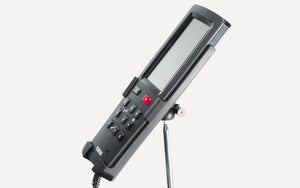remote in holder on Black Fujiiryoki JP-2000 Zero Gravity Massage Chair. Advanced 5D AI+ Full Body Massage Experience. Heated Back Massage & Therapeutic.