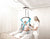 luna ceiling hoist in use by a female patient