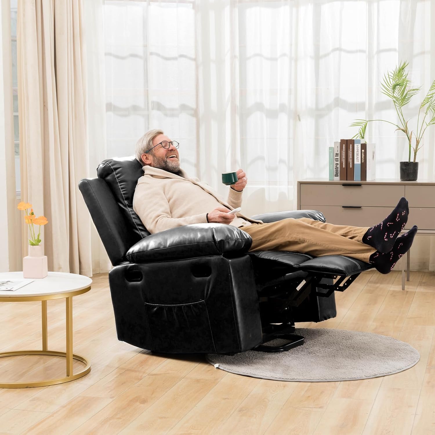 rise and recline in use as a man relaxes with coffee from amazon