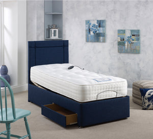 Adjust-A-Bed Pure 2000 Adjustable Electric Bed Frame With Orthopaedic 2000 pocket spring Mattress on navy blue bed base with headboard