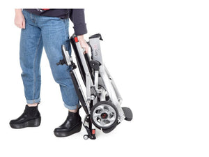 Motion Healthcare Aerolite Power chair, Lightweight, Electric Folding Wheelchair, Lithium Battery with woman carrying