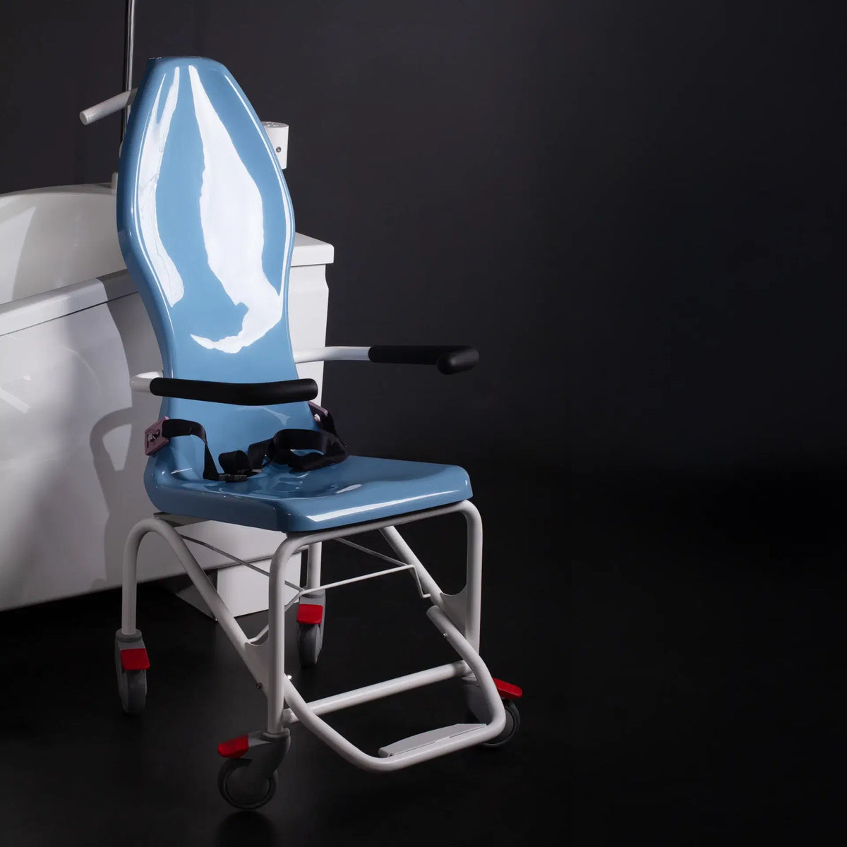 Astor Bannerman Compact DC3 Bath Seat attached to the transfer trolley