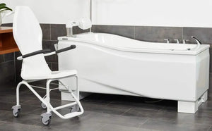 Astor Bannerman Compact Fixed Bath attached to the transfer trolley