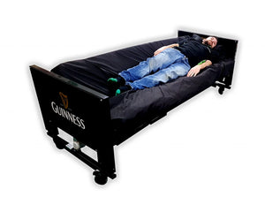 Centrobed Arctic Turning Profiling Bed in use to turn an adult male 