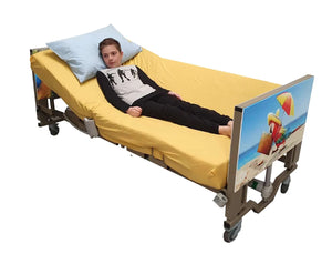 Centrobed Carribean Paediatric Turning Profiling Bed in use turned to one side