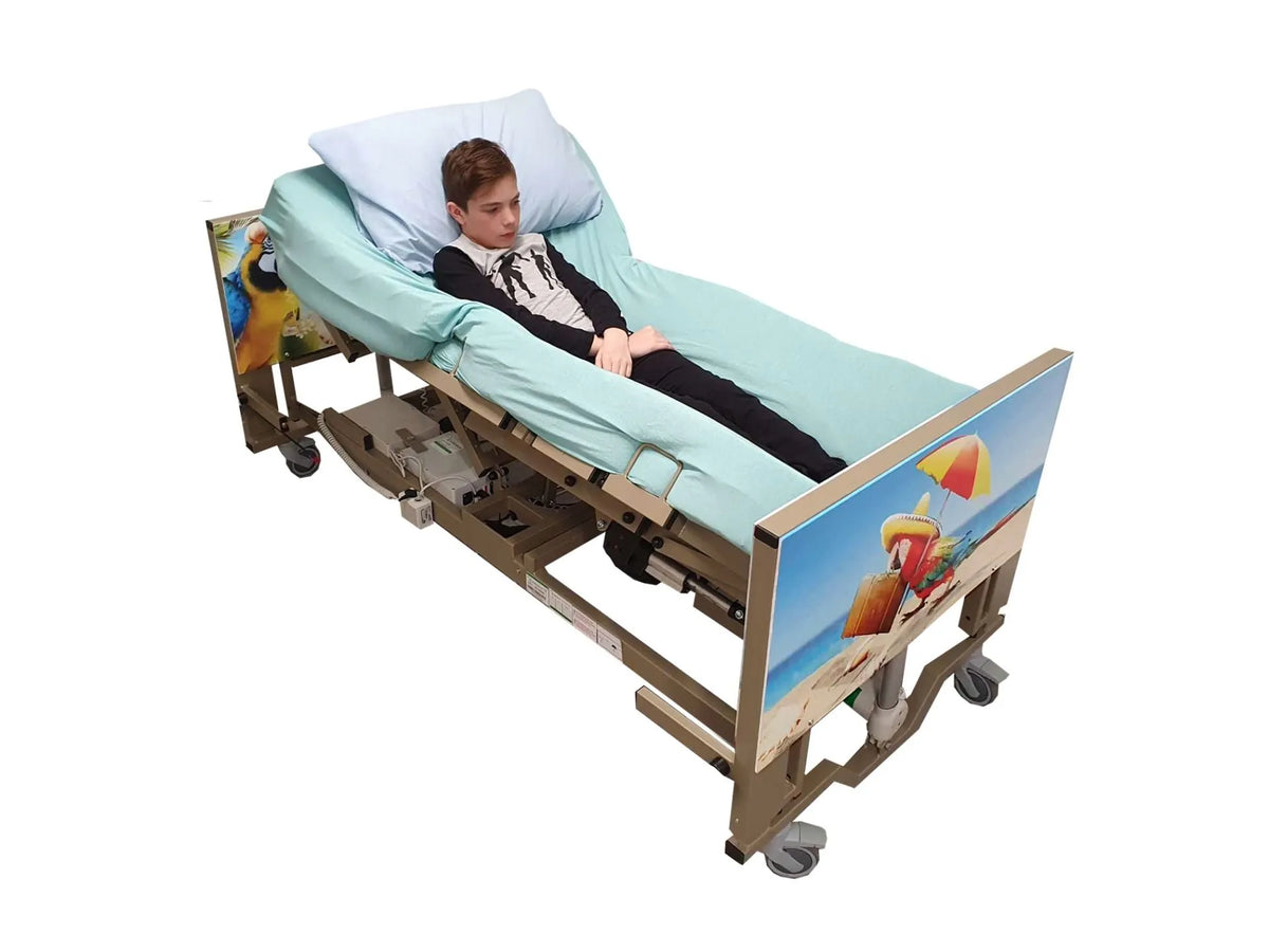 Centrobed Carribean Paediatric Turning Profiling Bed in use with panels lifted