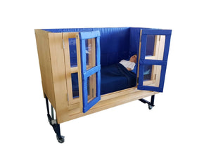 Centrobed Flores Cot in use with blue padding