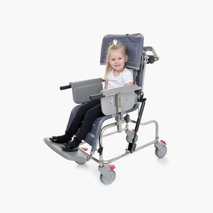 Child using the Osprey 900 Tilt in Space Infant Paediatric Shower Cradle