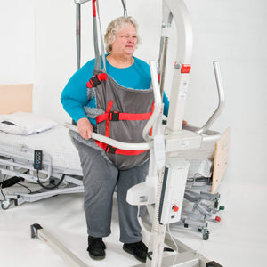 Direct Healthcare Group BariVest Bariatric Gait Trainer attached to a mobile hoist with patient