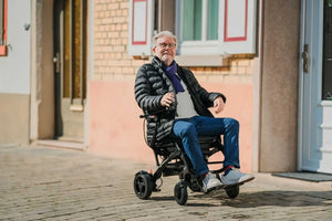 Drive Devilbiss AirFold Carbon Fibre Powerchair in use outdoors
