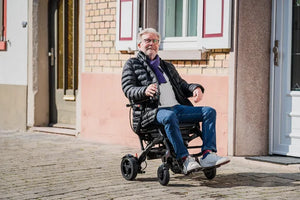 Drive Devilbiss AirFold Carbon Fibre Powerchair in use outdoors