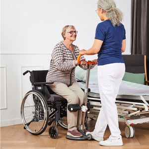 Etac Turner Pro Turn and Stand Aid in use standing from wheelchair