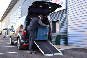 Enable Access Aerolight Max Portable Wheelchair Ramp in use to transfer equipments from car to pvement 