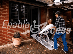 Enable Access Metro Mobility Aluminum Wheelchair Ramp in use on doorway