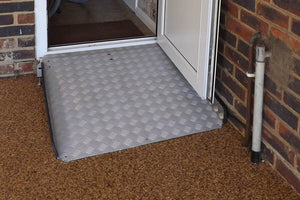 Enable Access Permaramp Adjust Superwide Bariatric Wheelchair Ramp on doorway