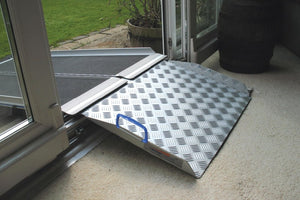 Enable Access Doorline Multi wheelchair ramp on top of dorrway after an aerolight ramp