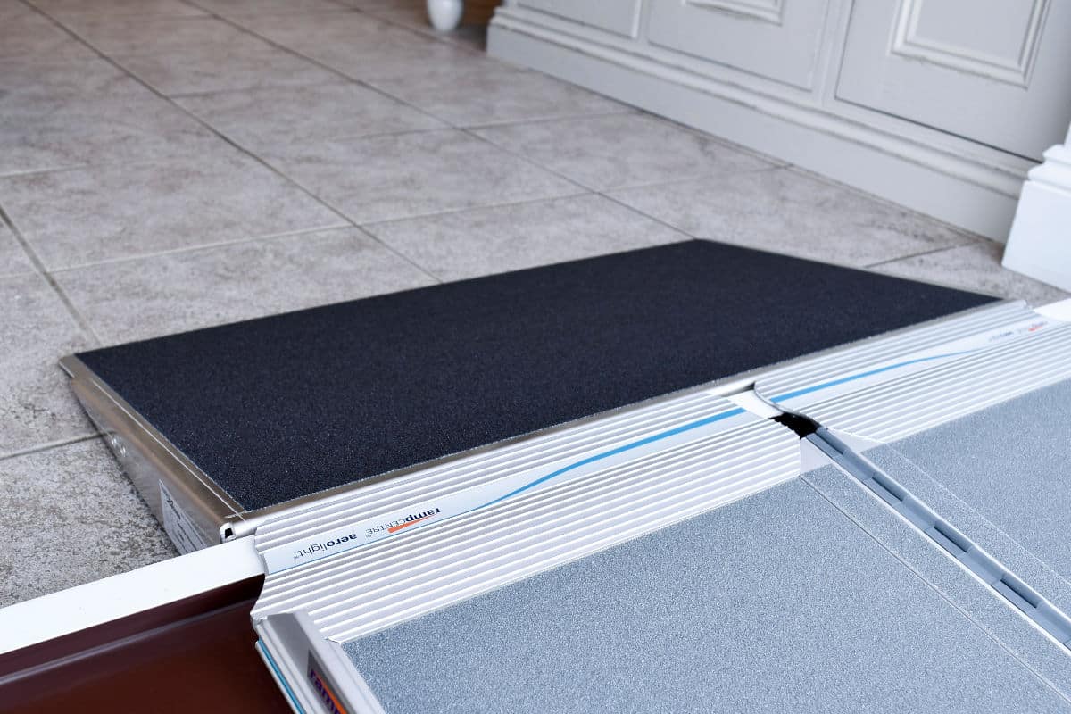 Enable Access Doorline-Threshold Wedge portable wheelchair ramp indoor next to another ramp