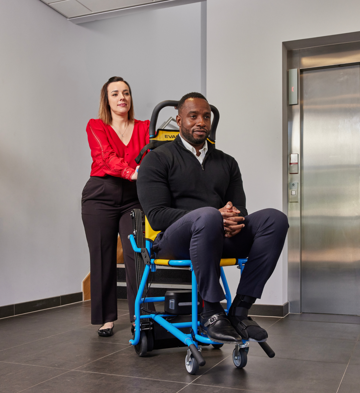 Evac + Chair 1000H Powered Evacuation Chair in use