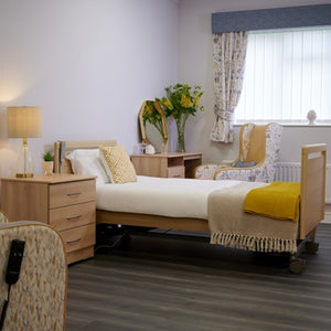 Harvest Healthcare Cadence Comfort Profiling Bed in a room