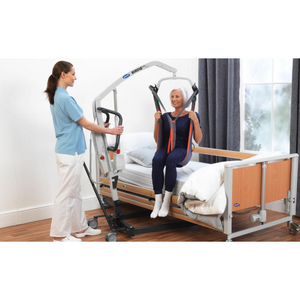 Birdie EVO and Birdie EVO Compact Comfortable, Compact Patient Lifts for Domestic and Care Environments lifting women to bed