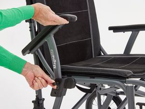 Adjusting the arm rest on the Motion Healthcare Magnelite transit and self propelled,, Lightweight, Folding Wheelchair, Manual and Self Propelled