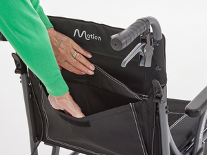 Storage pocket sleeve on the Motion Healthcare Magnelite transit and self propelled,, Lightweight, Folding Wheelchair, Manual and Self Propelled