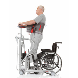 Patient standing with the help of Direct Healthcare Group MiniLift200 Mobile Sit-To-Stand Lift  and with belt 