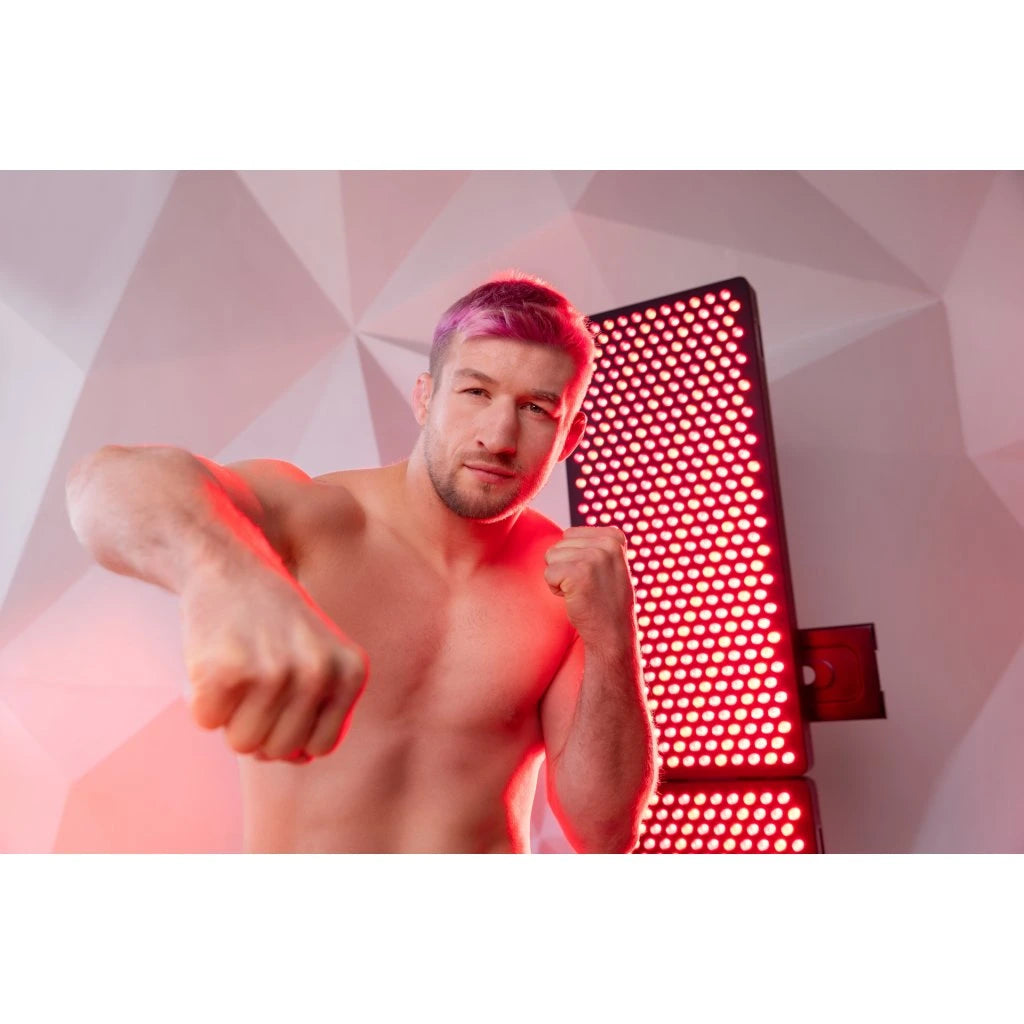 Mito Light Mitohacker 4.0 Red Light Therapy in use by a punching male user