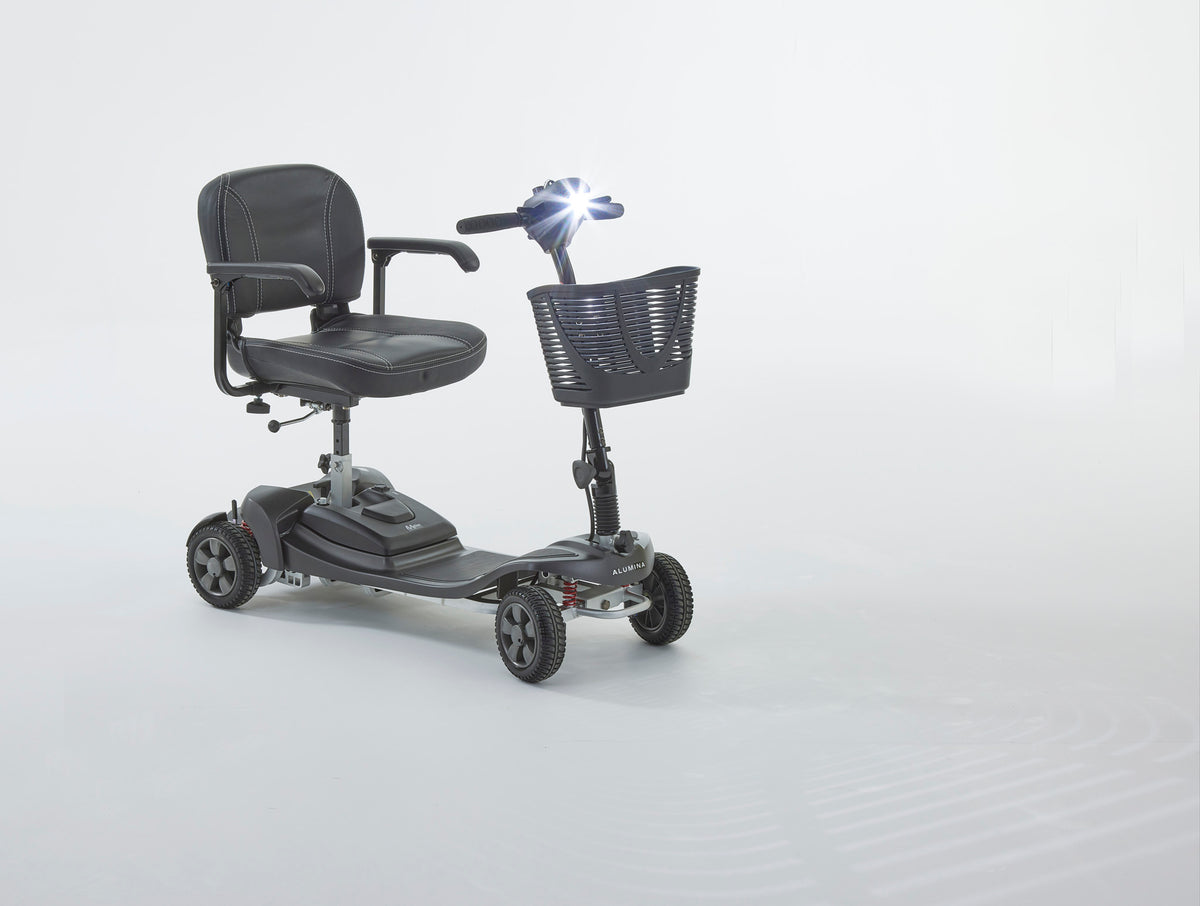 Motion Healthcare Alumina PRO, 4 Wheel, Lightweight, Electric Mobility Scooter with Lithium Battery, charcoal with head light on
