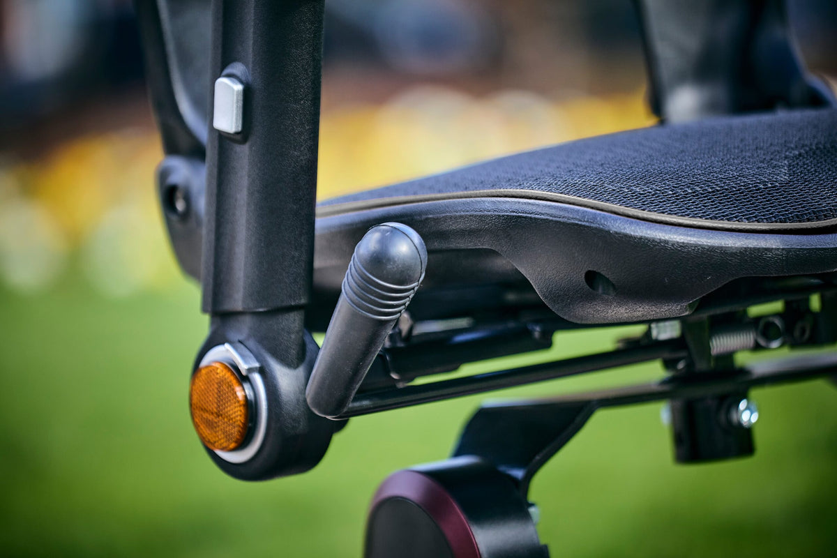 Motion Healthcare Connex Automatic Folding Mobility Scooter rotating seat system