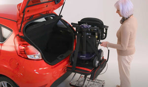 Motion Healthcare Elev8 Portable Mobility Scooter Hoist in use