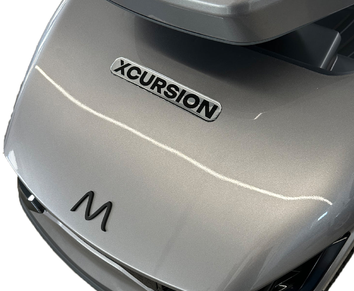 Motion Healthcare Xcursion Mobility Scooter logo