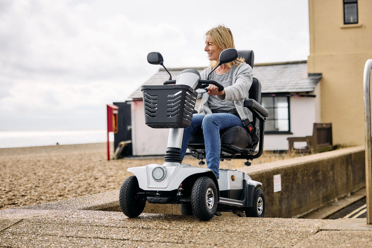 Motion Healthcare eMove 6 Mobility Scooter in use going up a slope