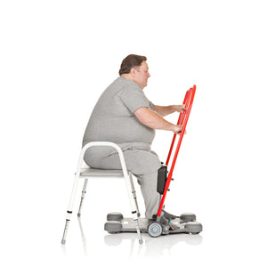 Side View of Patient Standing Up Using Direct Healthcare Group ReTurn7600 Sit-to-Stand and Transfer Assistive Device