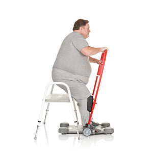 Side View of Patient Standing Up Using Direct Healthcare Group ReTurn7600 bariatric Sit-to-Stand and Transfer Assistive Device