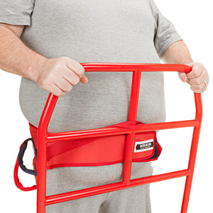 A person standing on the Direct Healthcare Group ReTurn7600 Sit-to-Stand and Transfer Assistive Device with belt accessory on their waist