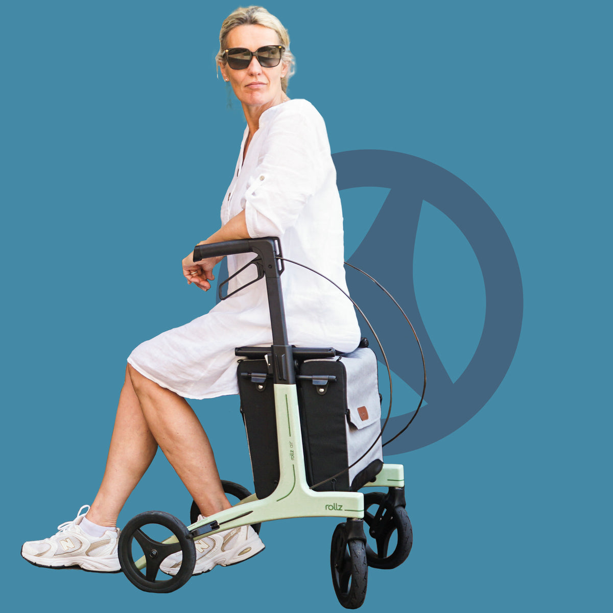 Rollz Air Lightweight Rollator in use by a lady sitting