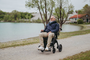 Rollz Motion Electric Rollator and Electric Wheelchair in use