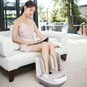 Sasaki DLUX 4D Leg Foot Massager in use 