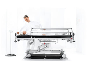 Seca 657 Platform Scale For Stretchers in use by patient and carer