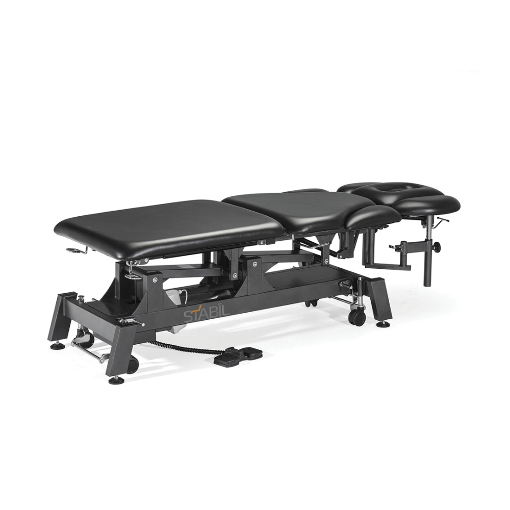 Stabil Pro 7-Section Electric Treatment Table  lying down position low height