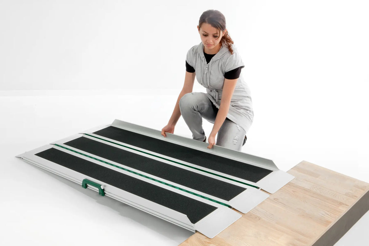 Stepless Guldman EasyFold Pro 3 Ramp being placed on platform