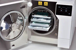 Tuttnauer T-Top Autoclave open door loaded