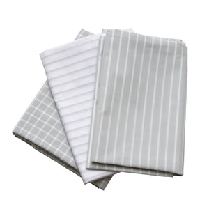 Folded WendyLett4Way Sliding DrawSheet with stripes and square pattern